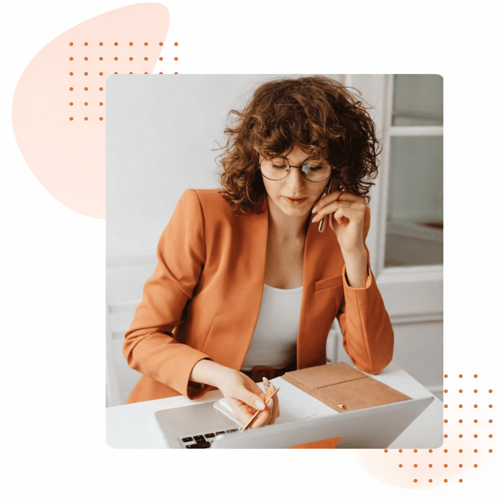 A professional interpreter in an office space preparing her agenda for interpretation appointments, translation services, and trainings 